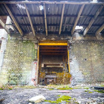 wide angle view of an old wall abandoned factory building