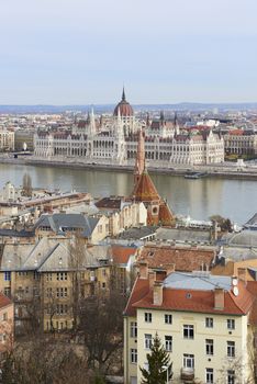 BUDAPEST, HUNGARY - FEBRUARY 02: Cityscape featuring the Hungarian Parliament building across Danube river. February 02, 2016 in Budapest.