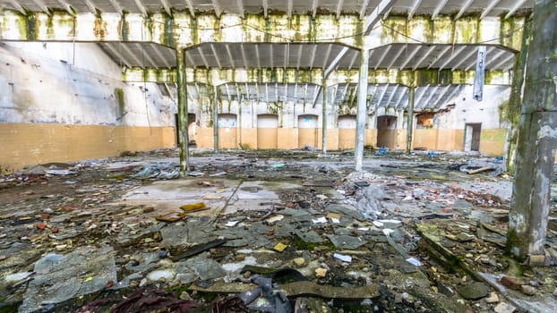 wide angle view of an old wall abandoned factory building