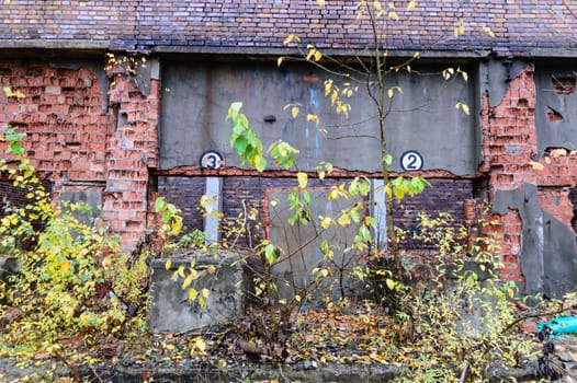 wide angle view of an old wall abandoned factory building