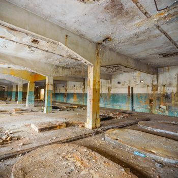 wide angle view of an old wall abandoned factory building
