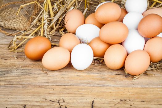 Eggs on wooden background
