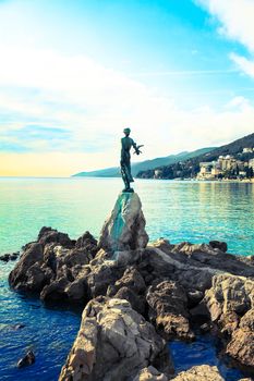 Opatija in Croatia. Sculpture of the woman with the sea.