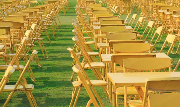 group of outdoor yellow table and chair