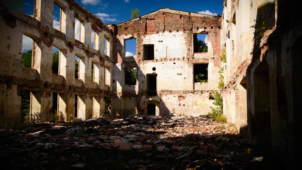 discarded ruin with old windows and wall, industrial window in concrete wall