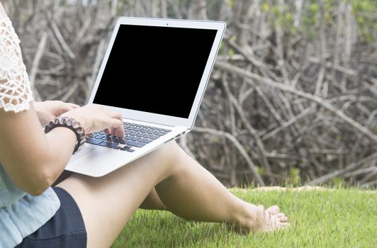 young women using laptop computer at home. technology concept, freelance concept, business concept, shopping online concept. Selective focus.