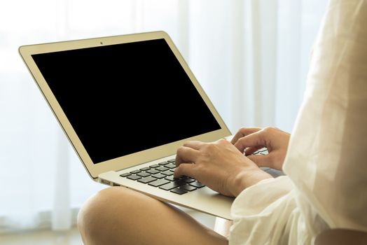 young women using laptop computer at home. technology concept, freelance concept, business concept, shopping online concept. Selective focus.