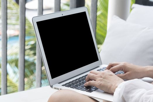 young women using laptop computer at home. technology concept, freelance concept, business concept, shopping online concept. Selective focus.