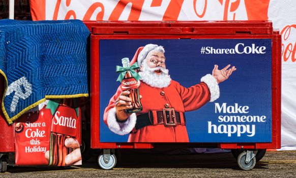 LOS ANGELES, CA/USA - December 6, 2015: Coca-Cola Christmas display featuring Santa Claus and the Shareacoke advertising campaign logo.