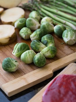 close up view of nice fresh vegetables on color background