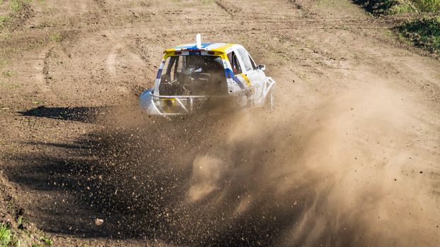 Car during a "stock car cross" race. The league called "stock car cross" foresees the use of tuned cars on unpaved circuits.