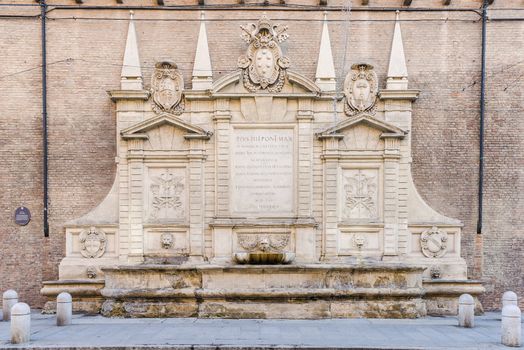Monumental stone fountain in the old town of Bologna, Italy, called Fontana Vecchia