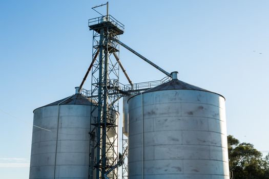 Grain silos set against a blue sky