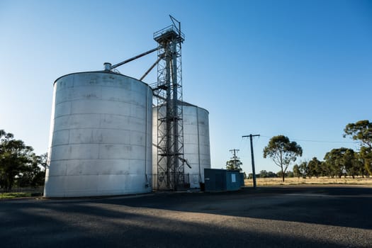 Grain silos set against a blue sky