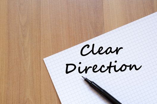 Clear direction text concept write on notebook with pen