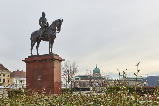 BUDAPEST, HUNGARY - FEBRUARY 02: Bronze statue of mounted military leader Artur Gorgey, with Buda Castle in the background. February 02, 2016 in Budapest.