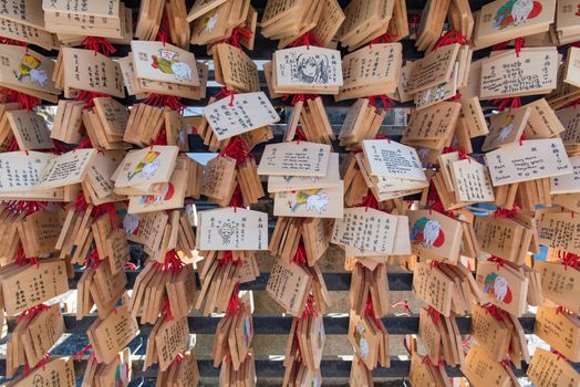 Kyoto, Japan - November 6, 2015: Dragon wooden prayer tablets at Kiyomizu dera - Kyoto. Pray for happieness, healthy, luck by write a word on wooden tablet.