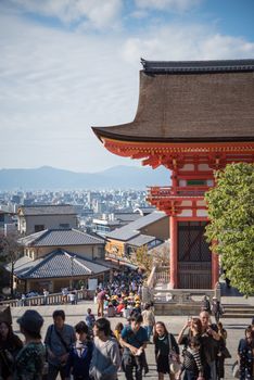 Kyoto, Japan - November 6, 2015: Tourists walk on a street around Kiyomizu Temple. Kiyomizu is a famous temple in Kyoto built in year 778. The temple is part of the Historic Monuments of Ancient Kyoto