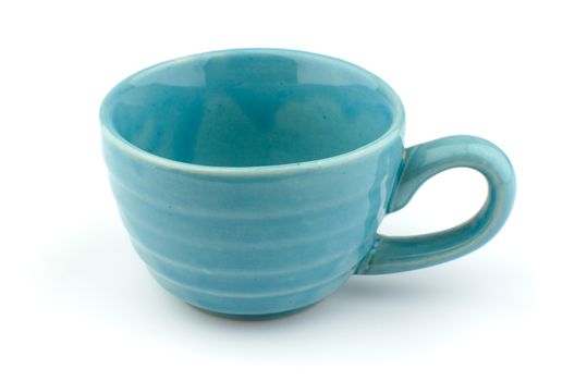 blue ceramic cup on a white background.