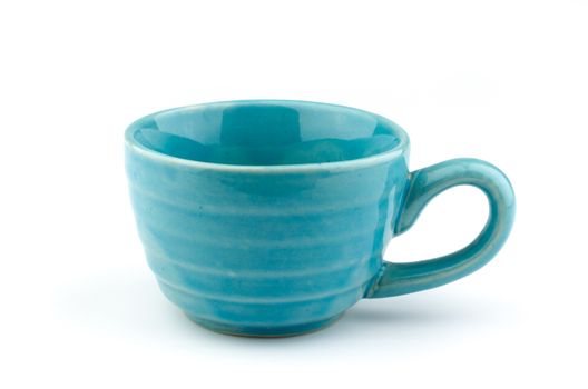 blue ceramic cup on a white background.