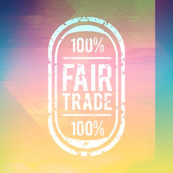 Fair Trade graphic against colored wood