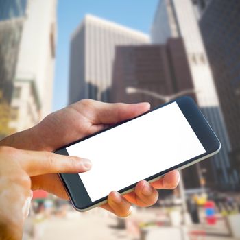 hand holding smartphone against new york