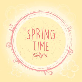 spring time text in circle with rings with flowers over beige old paper background