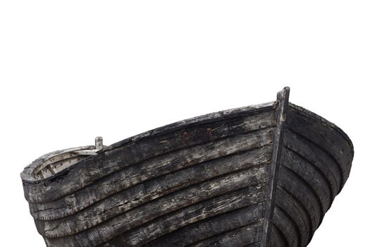 Horizontal side view of an old fishing wood boat with rusted nails isolated on white background