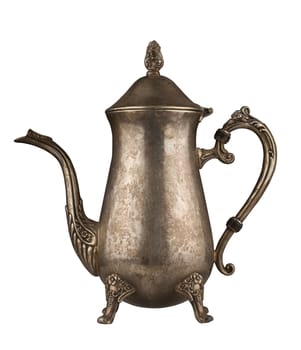 Silver vintage tea kettle with engravings isolated on white background