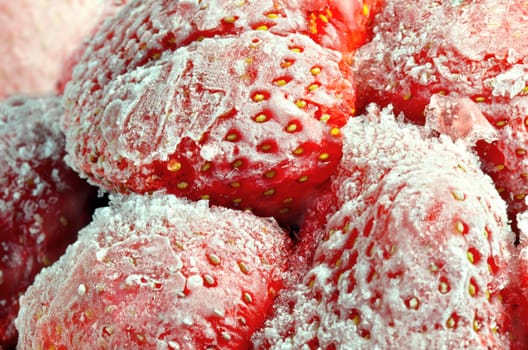 Frozen strawberries as macro still life.
