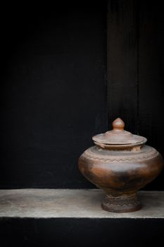 Pottery drinking water jar from northen thailand background