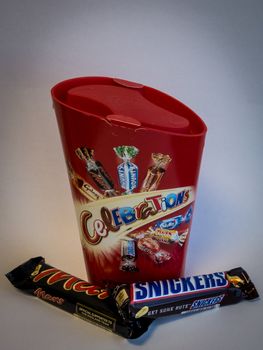 UK, London: A stock photo shows a box of Celebrations a Mars and a Snicker bar after Mars withdrew the popular chocolate confectioneries Mars, Snickers and Celebrations from sale following foreign bodies, believed to plastic, found in the items on February 23, 2016. Mars are investigating the matter. 