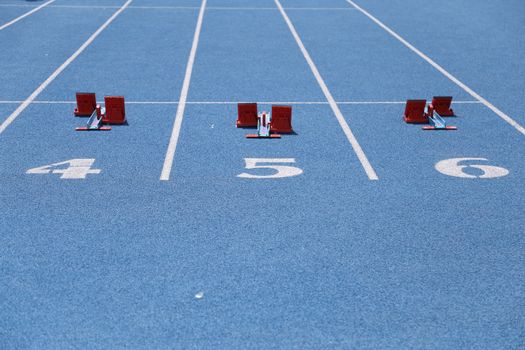 Numbers at finish line of 60 meters running field