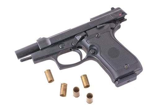 The gun with the bullets isolated on a white background