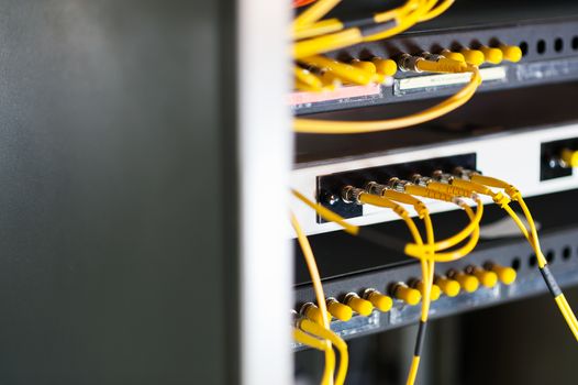 fiber optic with servers in a technology data center .