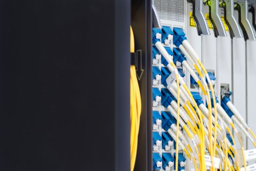 fiber optic with servers in a technology data center .