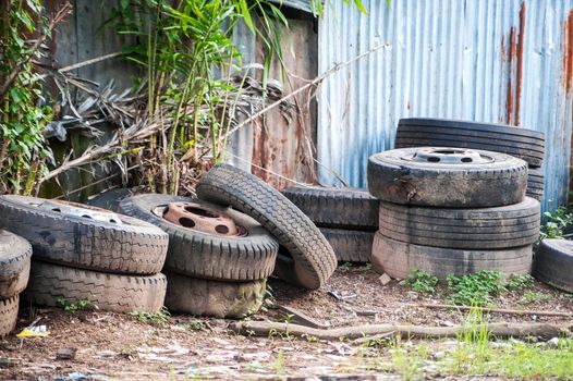 An Old tires in soft light .