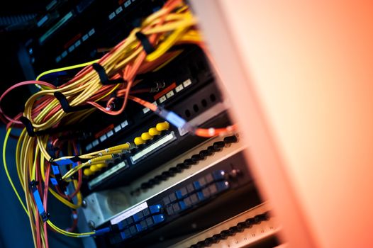 fiber optic with servers in a technology data center .