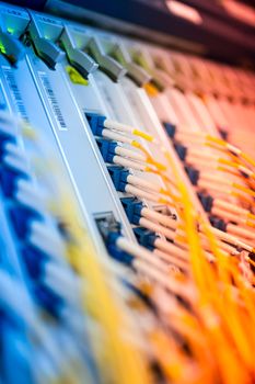 fiber optic with servers in a technology data center .