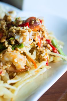 papaya salad with horse crab close up .