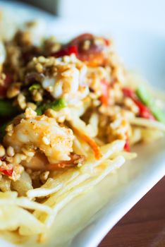 papaya salad with horse crab close up .