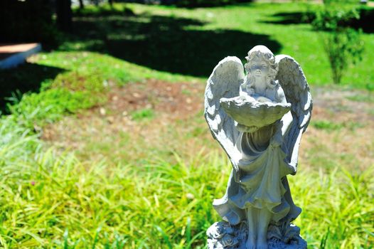 An Statue angel ancient symbol old face .