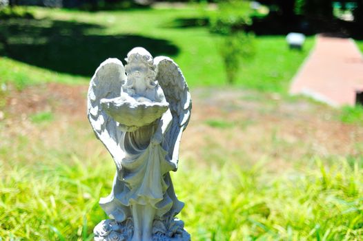 An Statue angel ancient symbol old face .