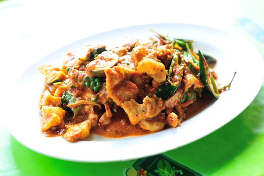 SPICY STIR FRIED PORK WITH RED CURRY .