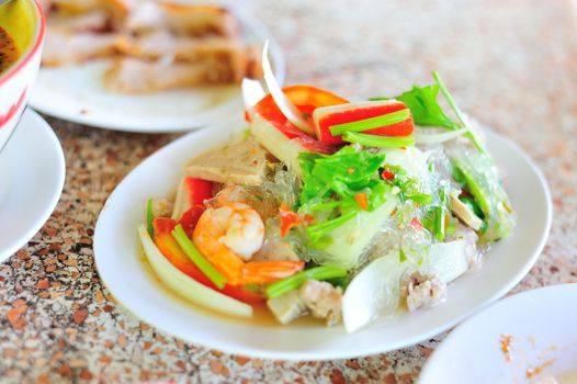 vermicelli salad thai food in soft light .