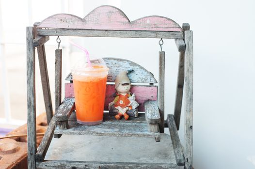 An Carrot juice in soft light .