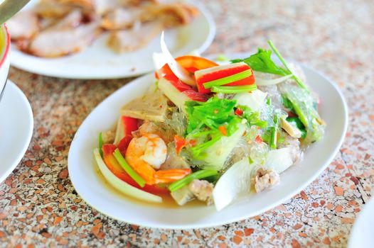 vermicelli salad thai food in soft light .