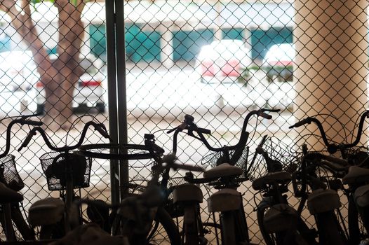 An Old bicycle in soft light .