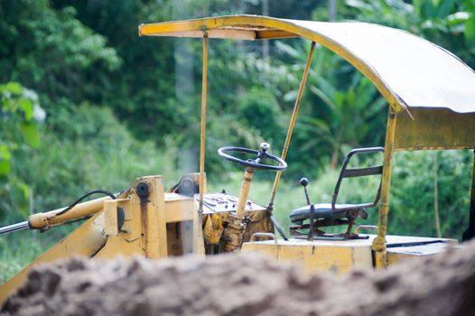 An excavator on a construction site .