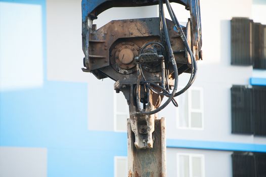 An Machine Drilling in Construction place .